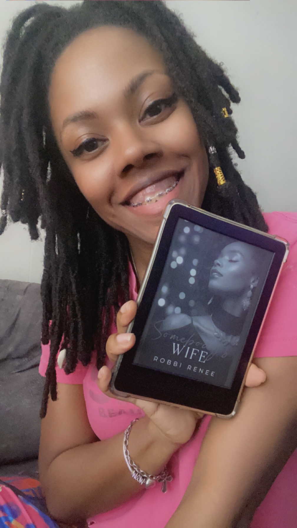 ash shalee reading somebody's wife book by robbi renee